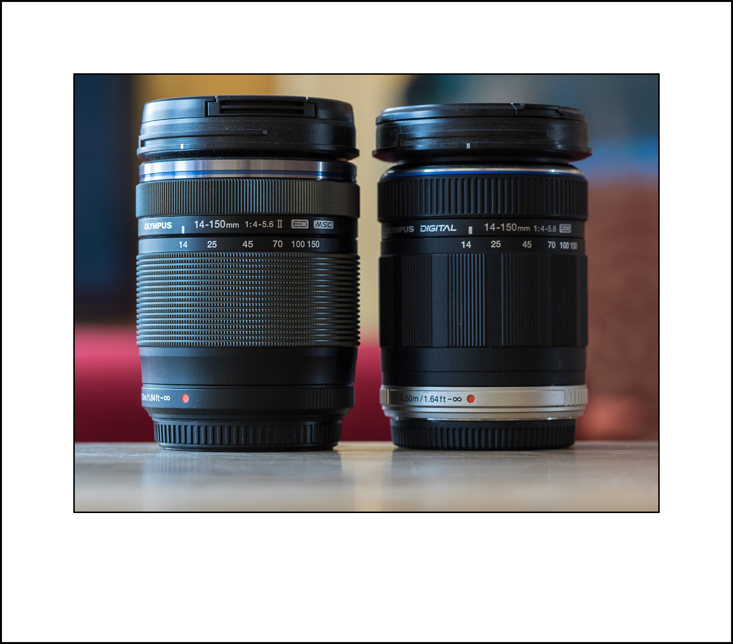 The two Olympus 14-150 lenses